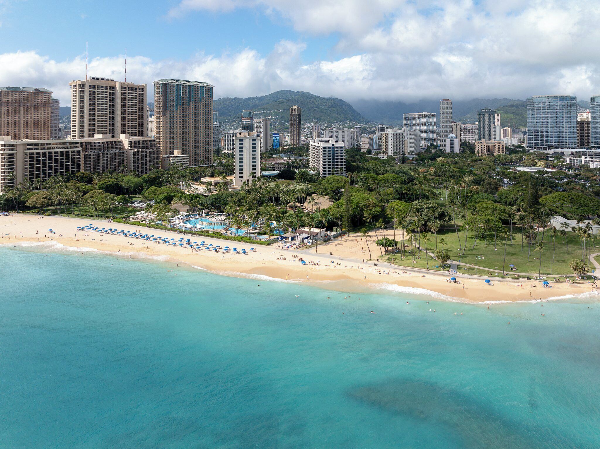 beach nearby, white sand, beach towels