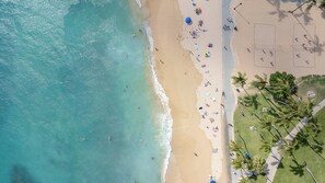 Beach nearby, white sand, beach towels