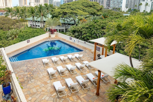 Outdoor pool, open 9:00 AM to 9:00 PM, free cabanas, sun loungers