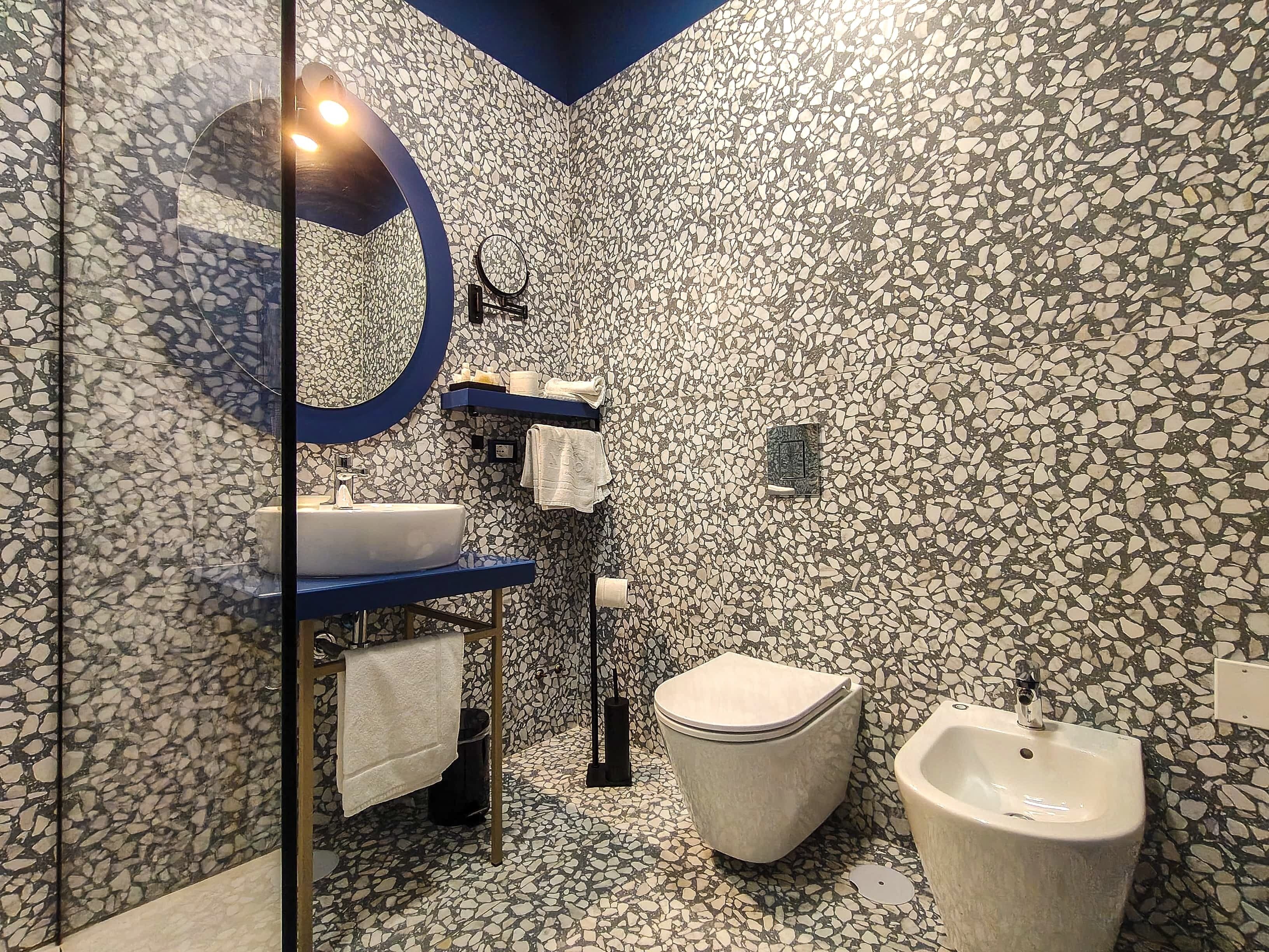 design room | bathroom | free toiletries, hair dryer, bidet, towels