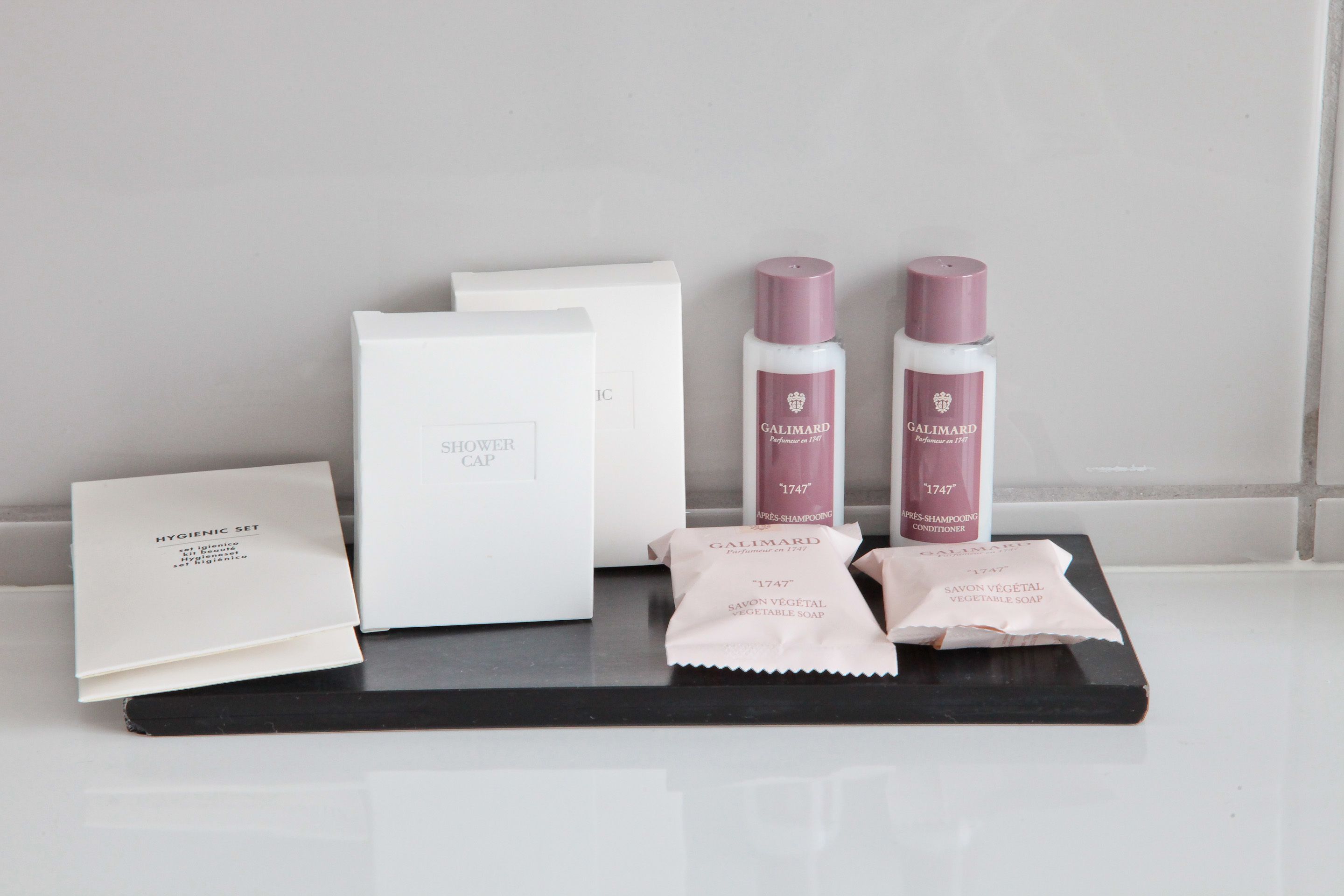 shower, rainfall showerhead, hair dryer, towels