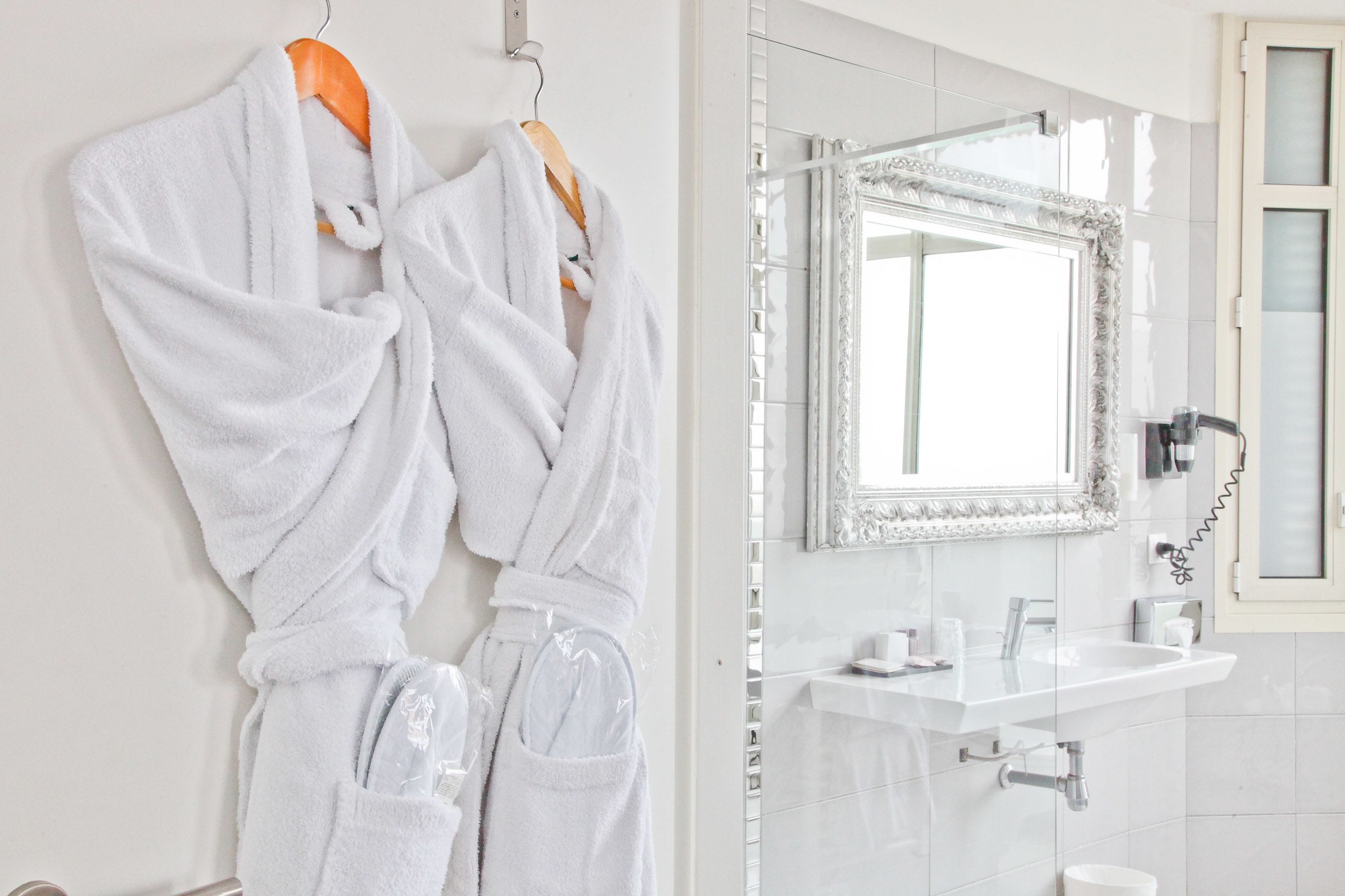 executive double room | bathroom | shower, rainfall showerhead, hair dryer, towels