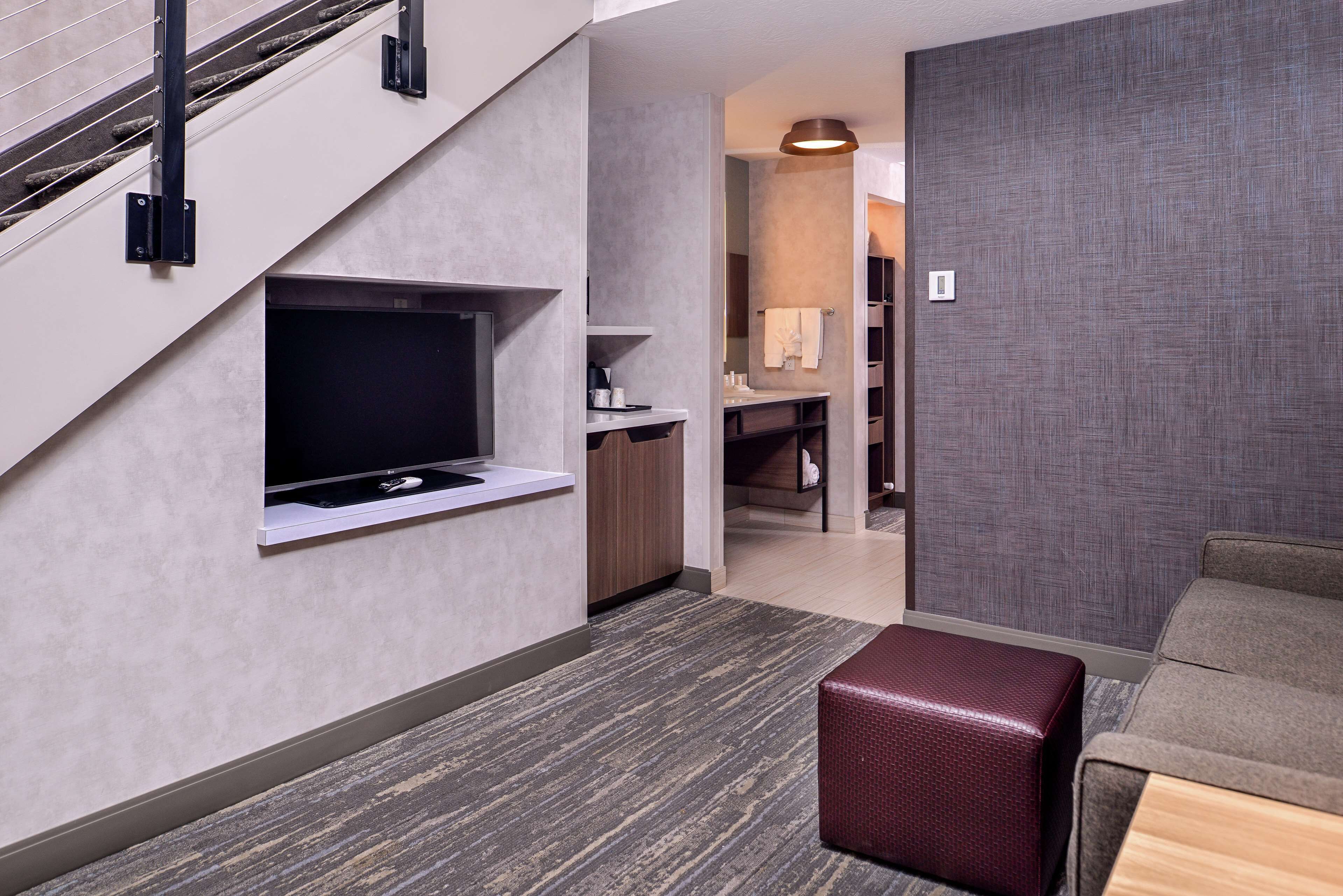 suite, multiple beds | living area | 42-inch tv with cable channels