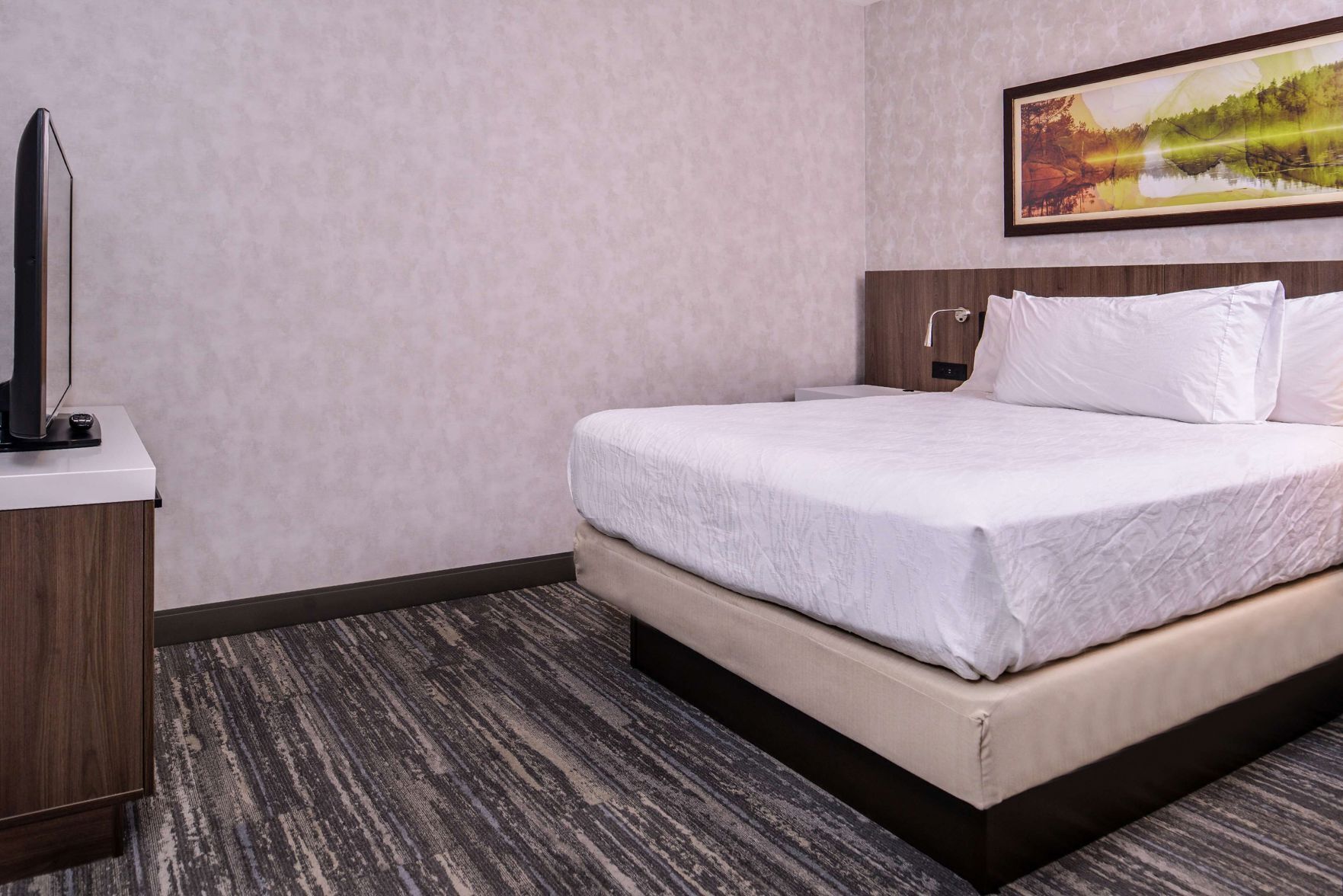 Hypo-allergenic bedding, blackout drapes, iron/ironing board, free WiFi