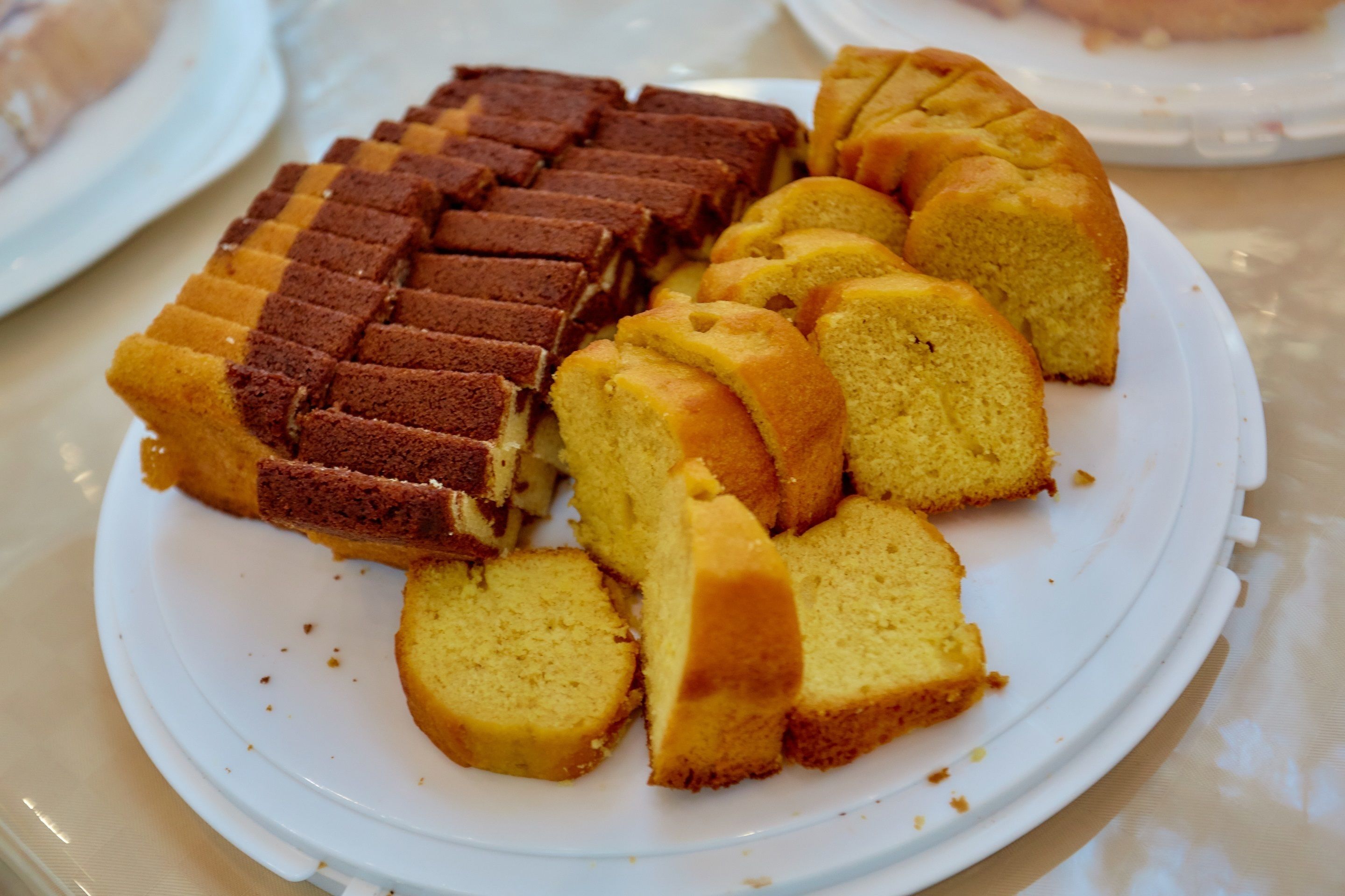 A plate of bread slices on a white plate.