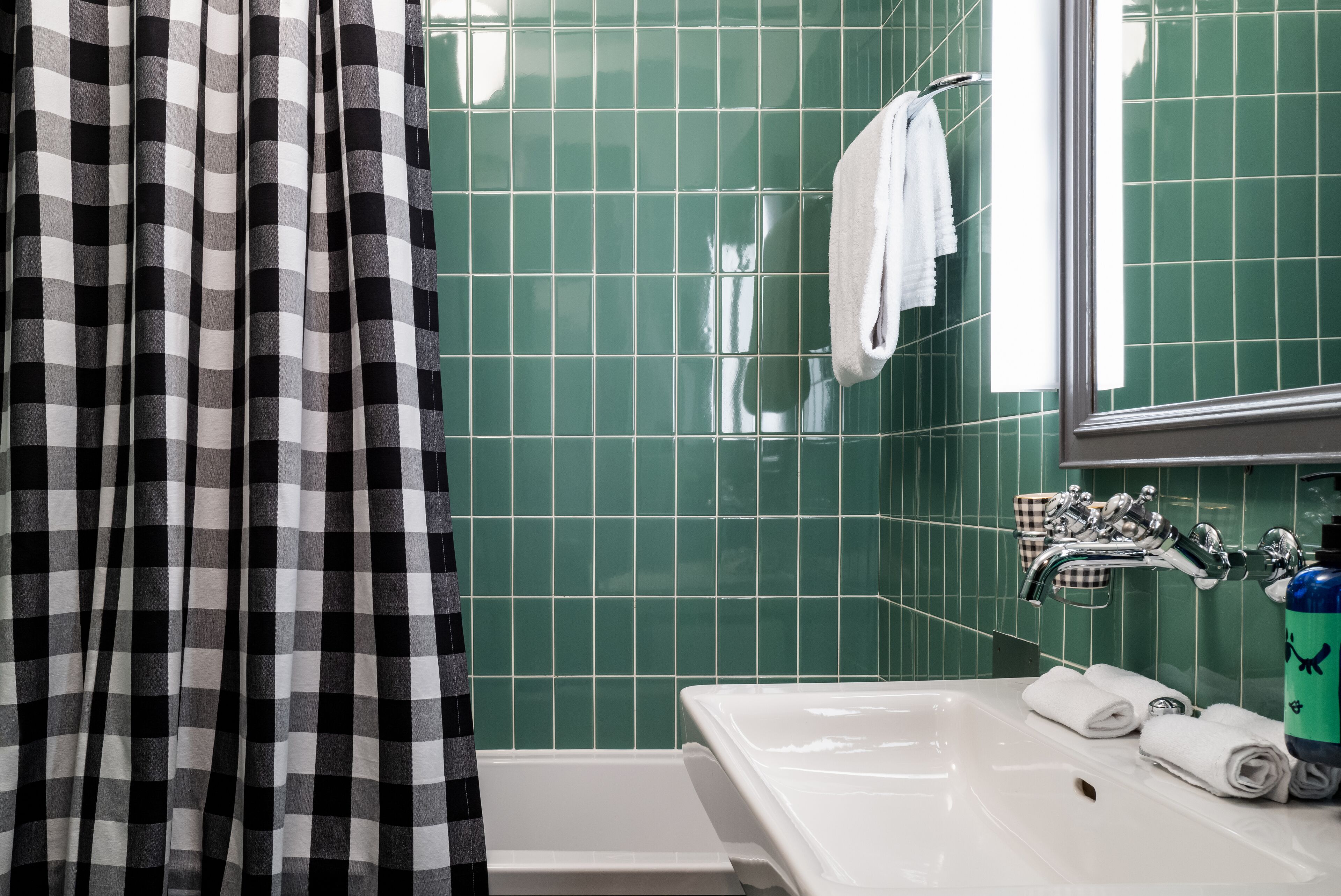 bathtub, free toiletries, hair dryer, slippers