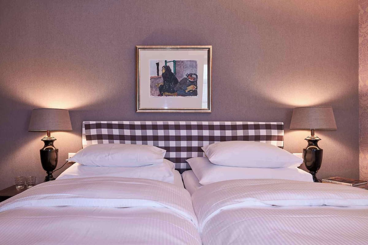 Premium bedding, down duvets, free minibar, in-room safe