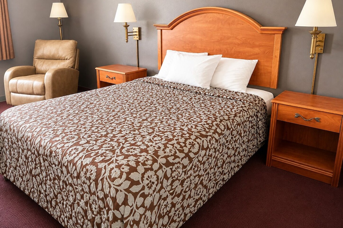 Blackout drapes, iron/ironing board, WiFi (free), alarm clocks