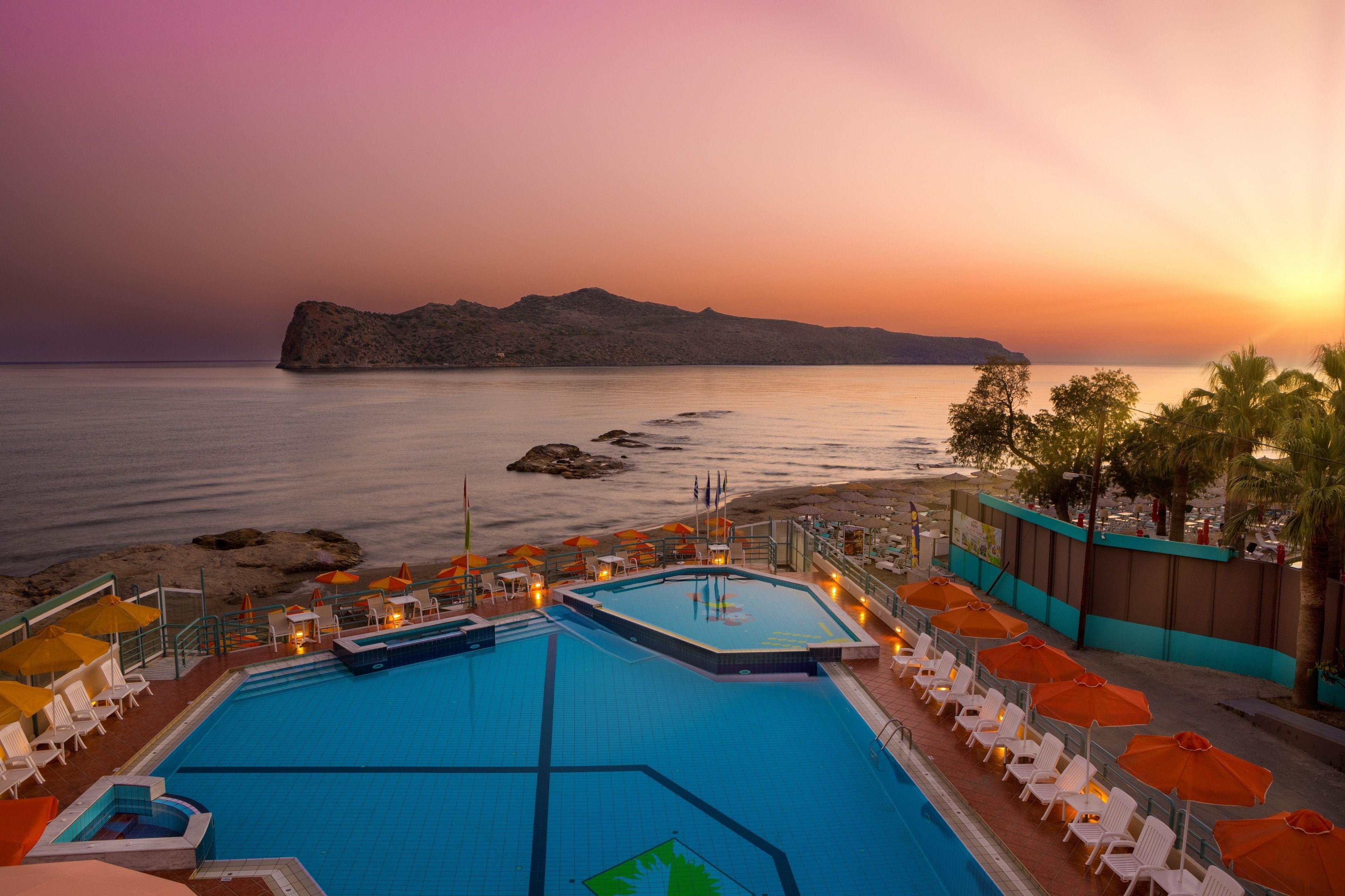 On the beach, sun loungers, beach umbrellas, beach towels