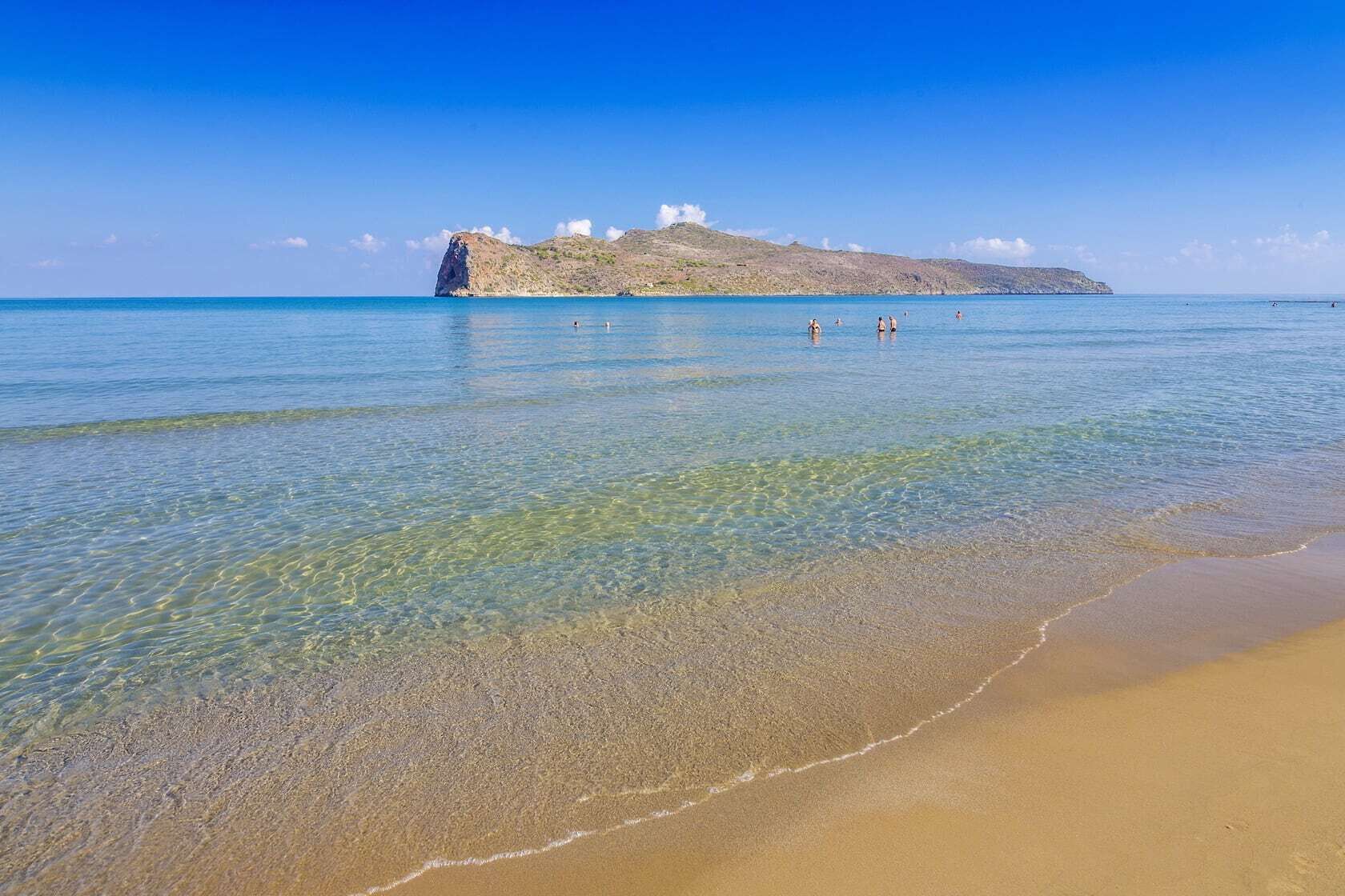 On the beach, sun loungers, beach umbrellas, beach towels