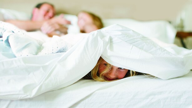 A bedroom with a bed covered by white sheets and a white blanket. - La Quinta Inn & Suites by Wyndham Knoxville West (Knoxville)