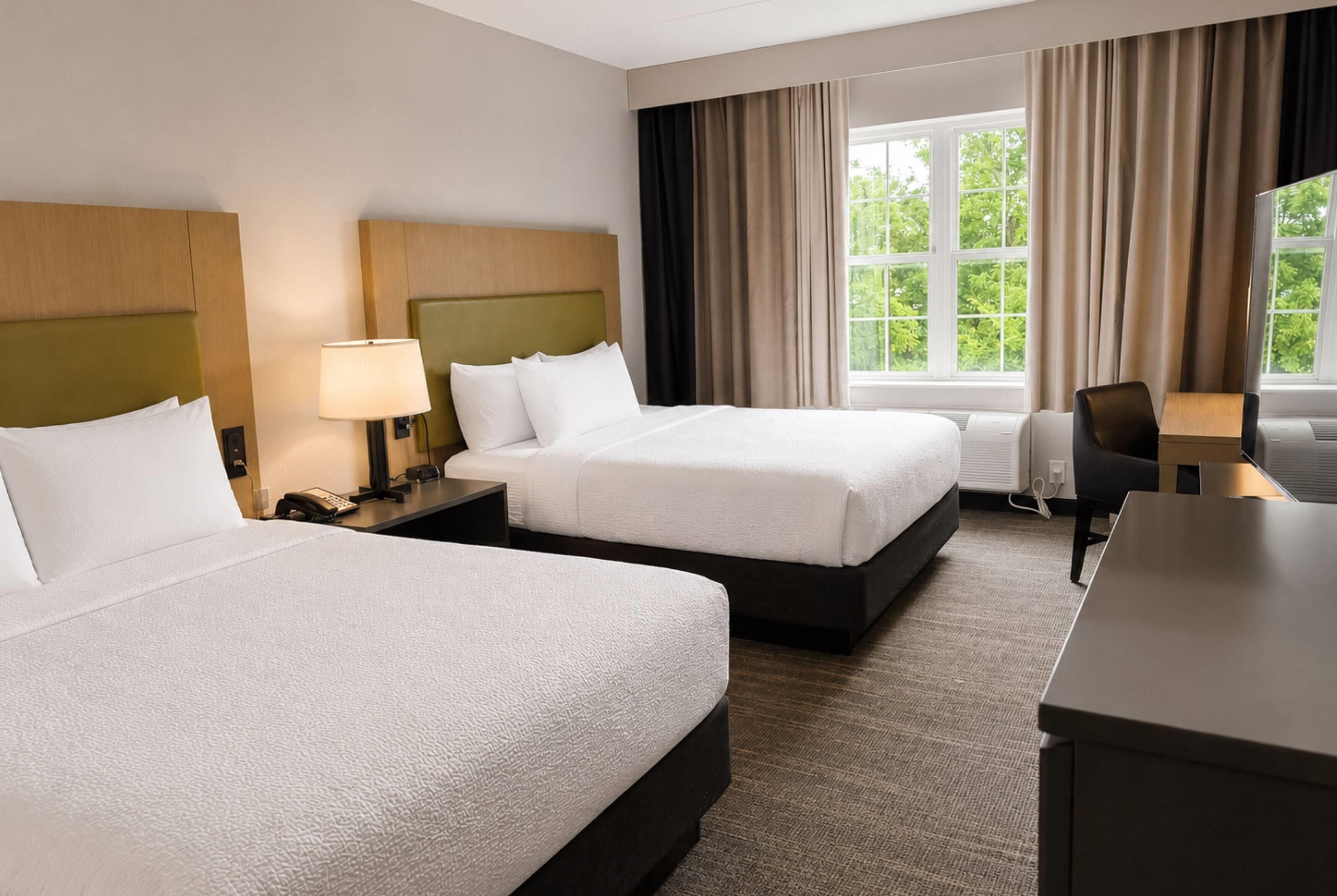 Premium bedding, down comforters, pillowtop beds, desk