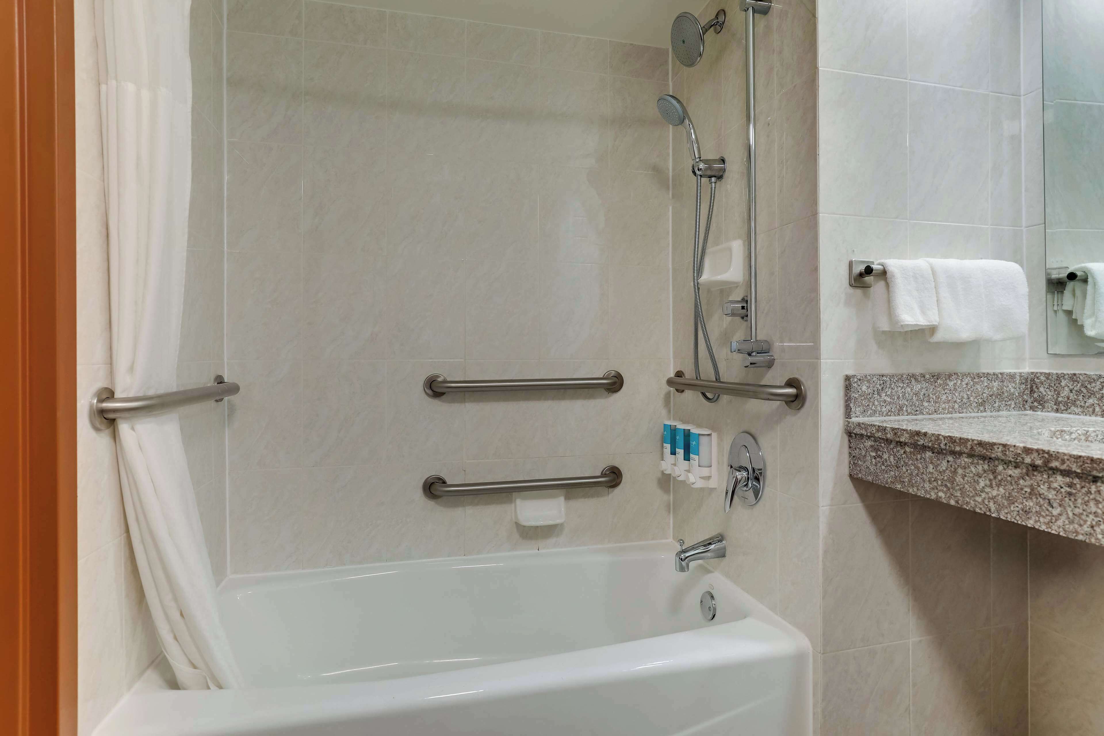combined shower/bathtub, free toiletries, hair dryer, towels