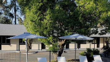 Outdoor pool, pool umbrellas, pool loungers