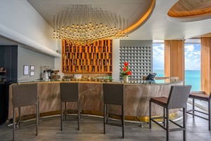 2 bars/lounges, swim-up bar, poolside bar