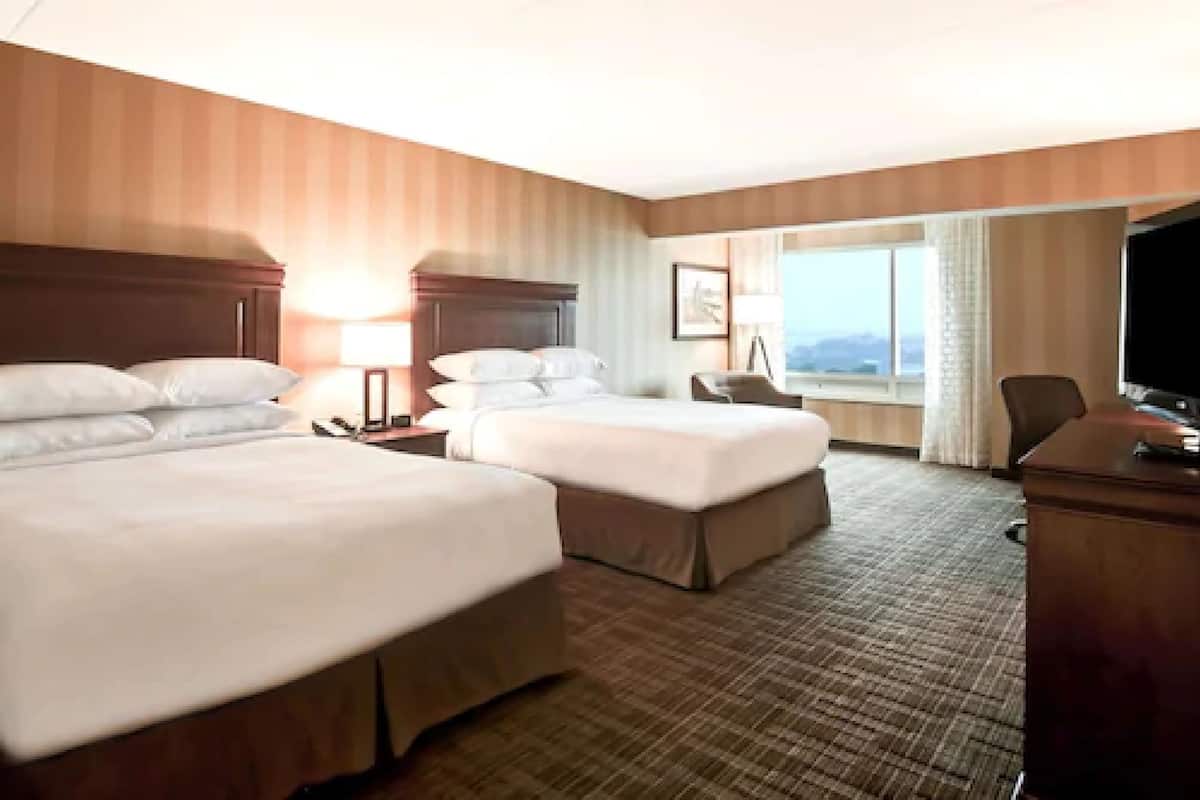 premium bedding, down duvets, pillow-top beds, in-room safe