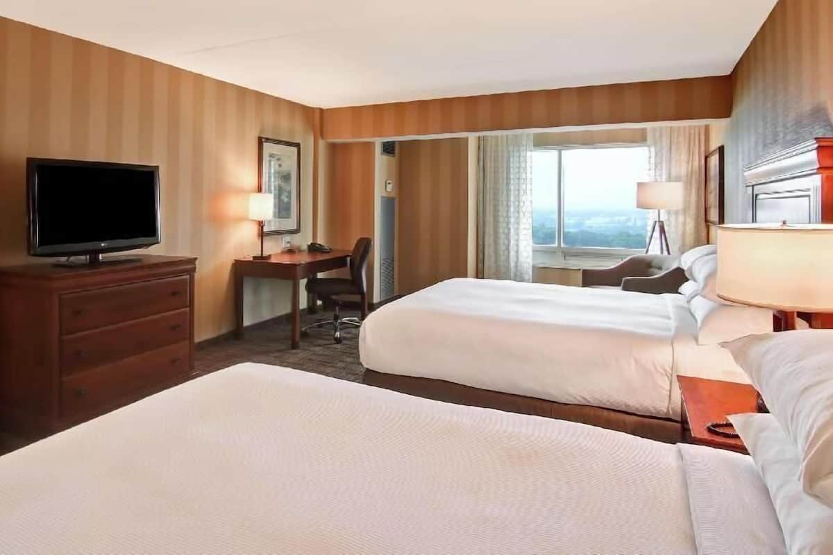 Premium bedding, down duvets, pillow-top beds, in-room safe