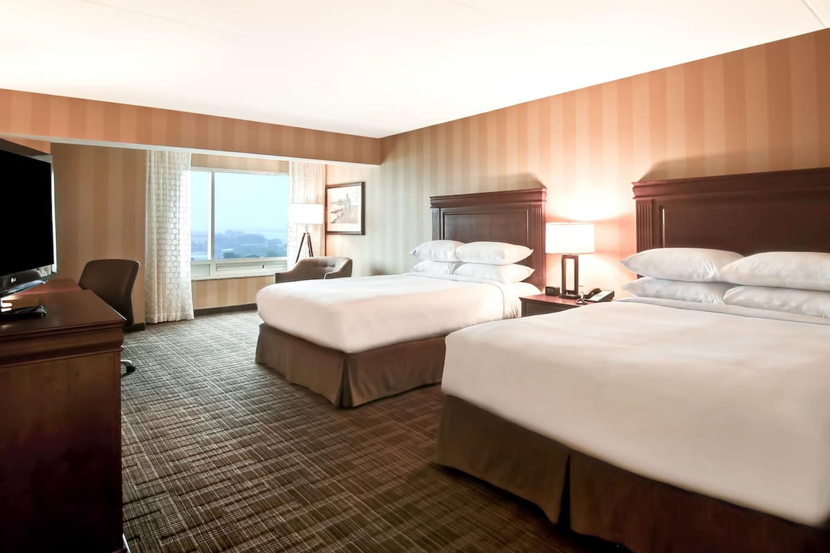 Premium bedding, down comforters, pillowtop beds, in-room safe