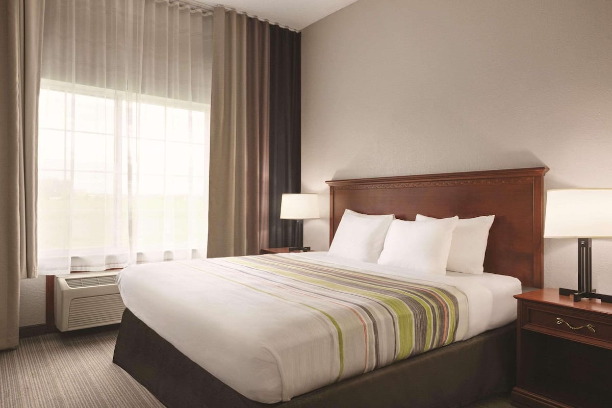 in-room safe, desk, blackout curtains, iron/ironing board