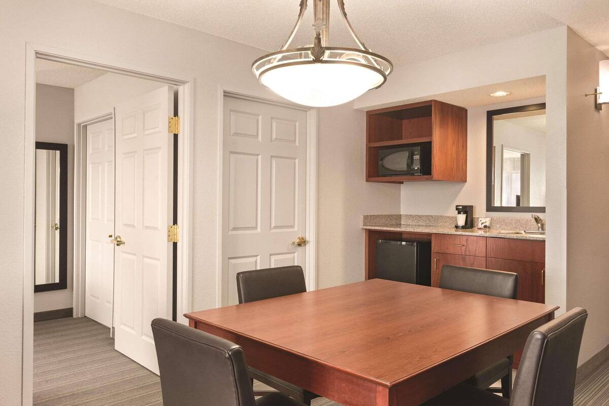 in-room safe, desk, blackout curtains, iron/ironing board