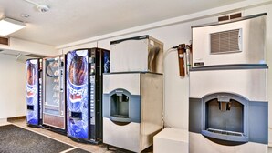A row of vending machines and a refrigerator in a commercial setting. - Go 2 By Relianse - Pittsburgh, PA - Cafton (Pittsburgh)