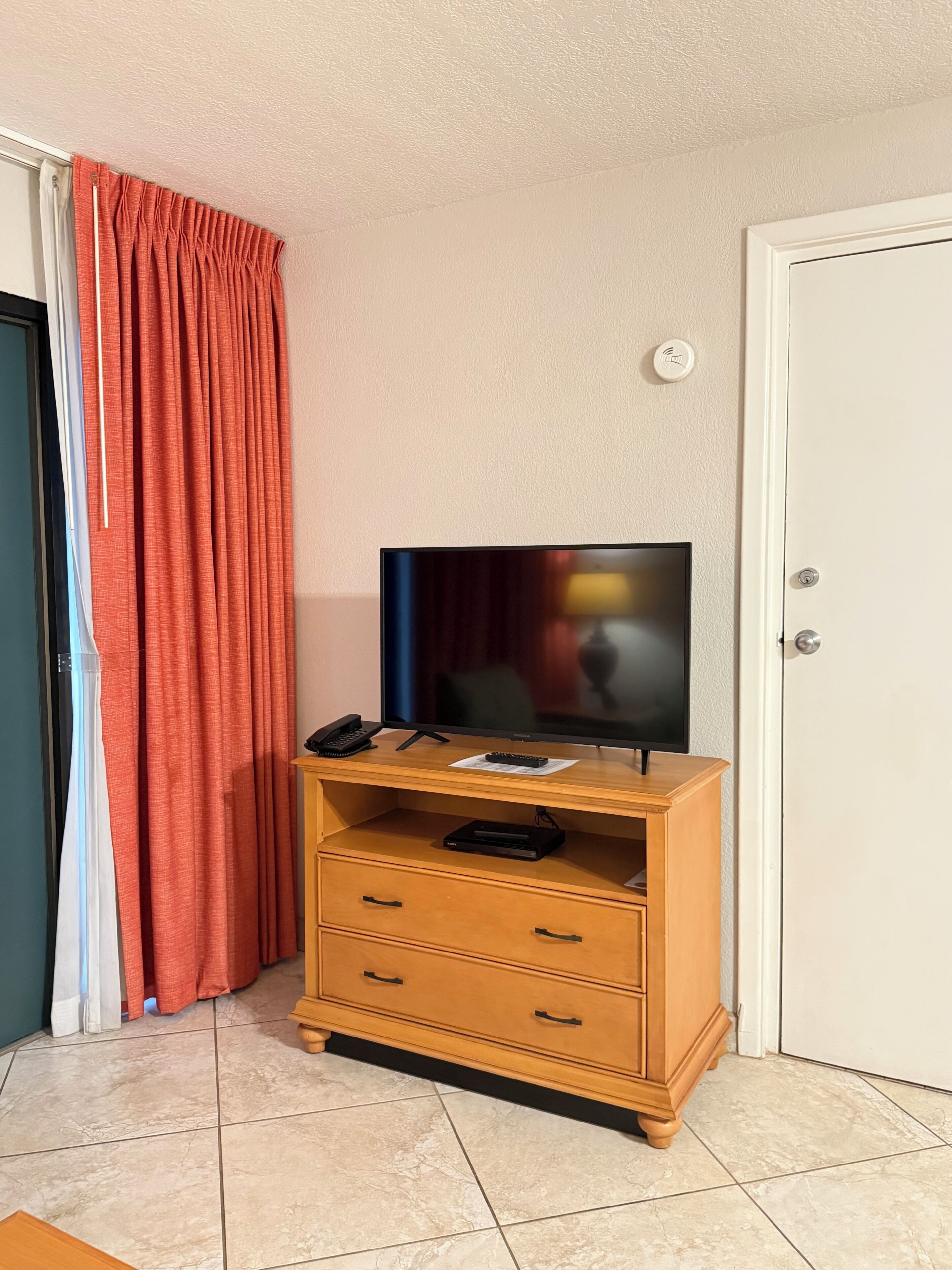 32-inch TV with cable channels, DVD player