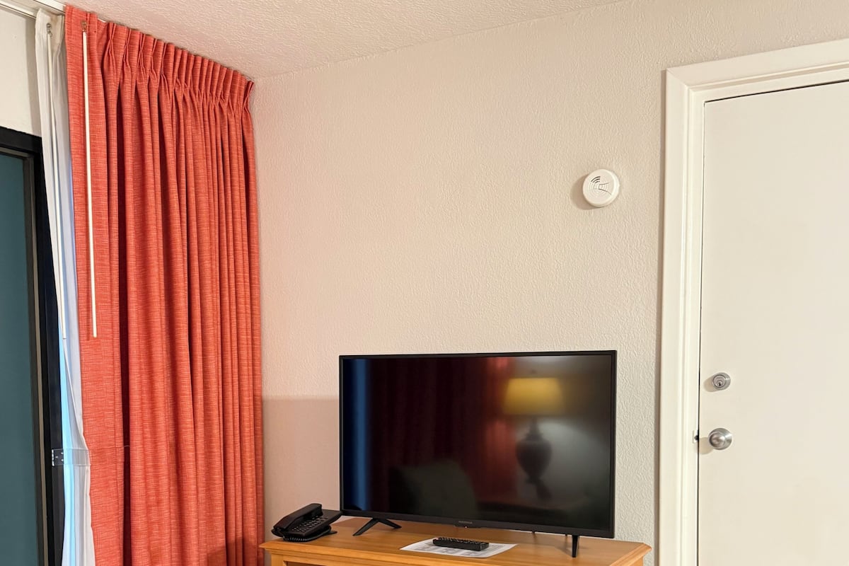 32-inch TV with cable channels, DVD player