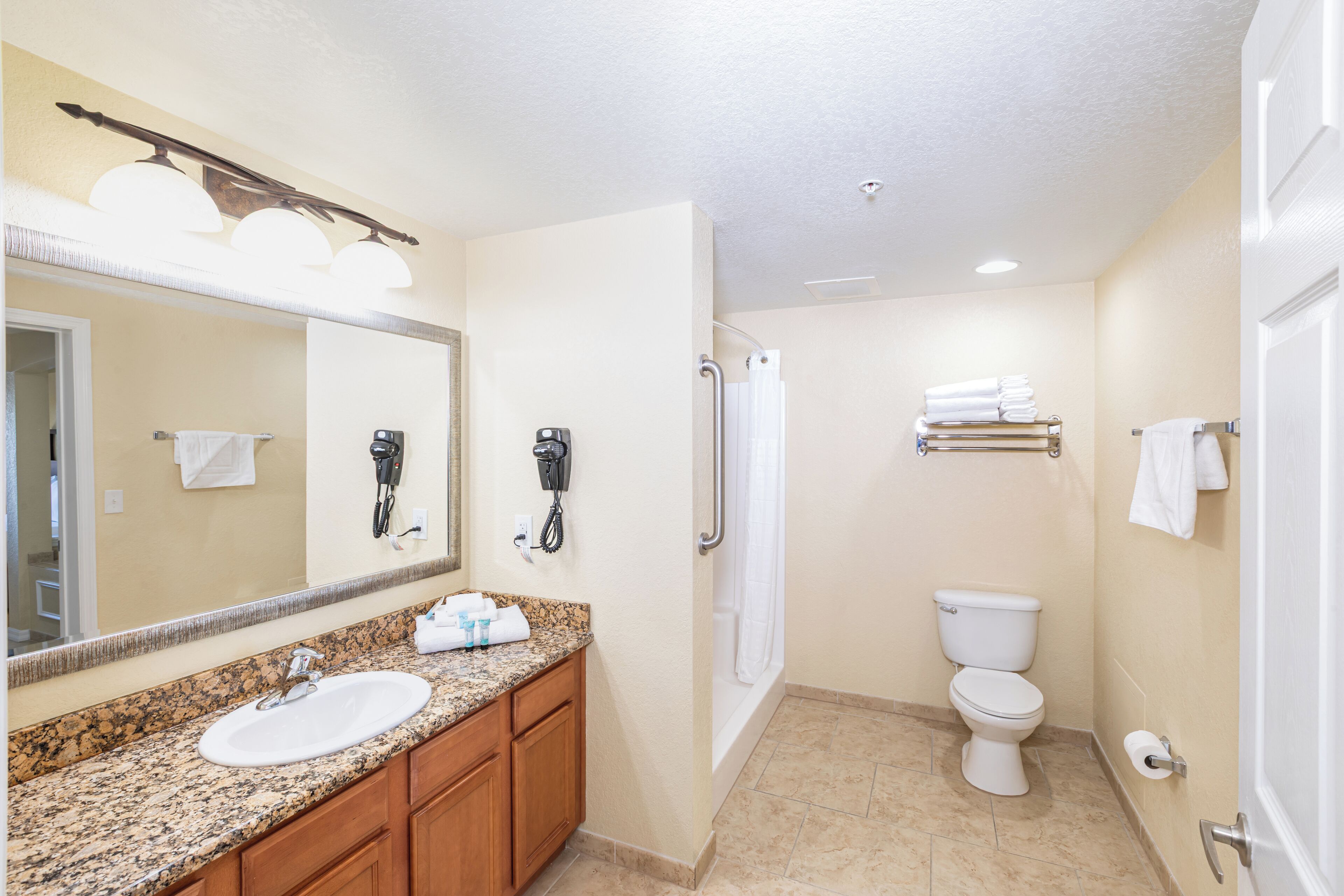 Hair dryer, towels, toilet paper