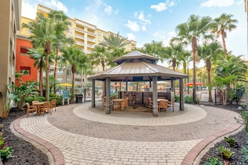 7 outdoor pools, pool umbrellas, sun loungers at Vacation Village Orlando, Celebration