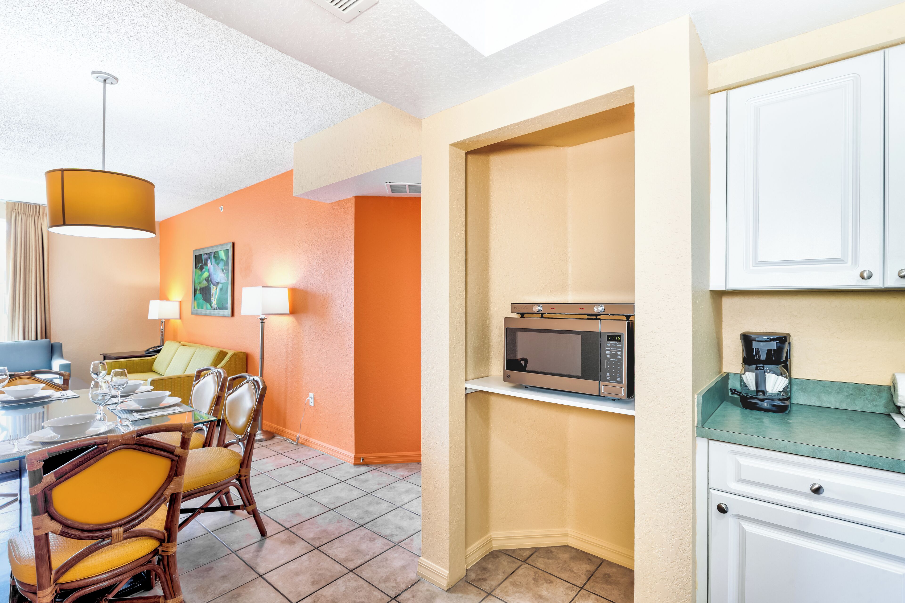 Full-sized fridge, microwave, stovetop, coffee/tea maker