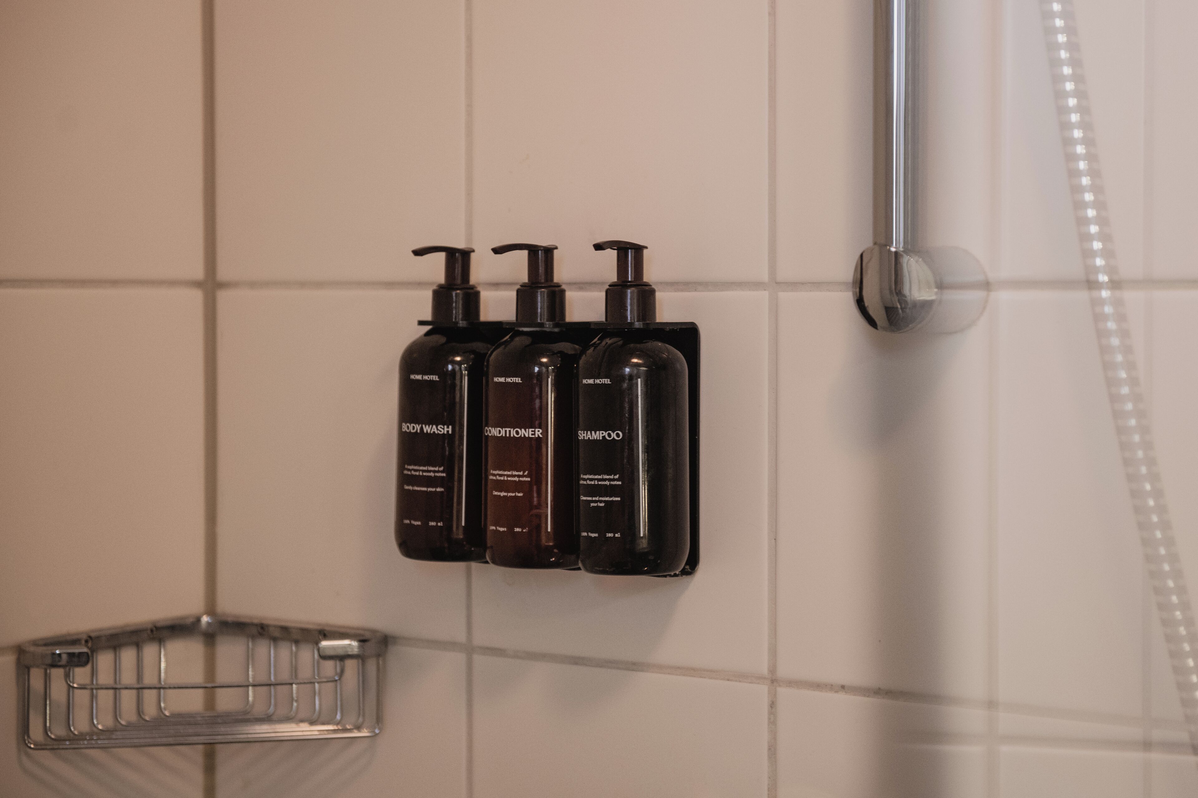 deluxe double room | bathroom | shower, hair dryer, towels, shampoo