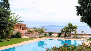 Indoor pool, outdoor pool, pool umbrellas, sun loungers