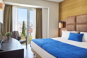 Superior Room (Acropolis View) | In-room safe, desk, laptop workspace, blackout drapes