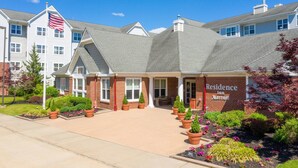 A two-story building with a brick facade and a grey roof, featuring a sign that reads "Residence Inn Marriott". - Residence Inn by Marriott Princeton at Carnegie Center (Princeton)