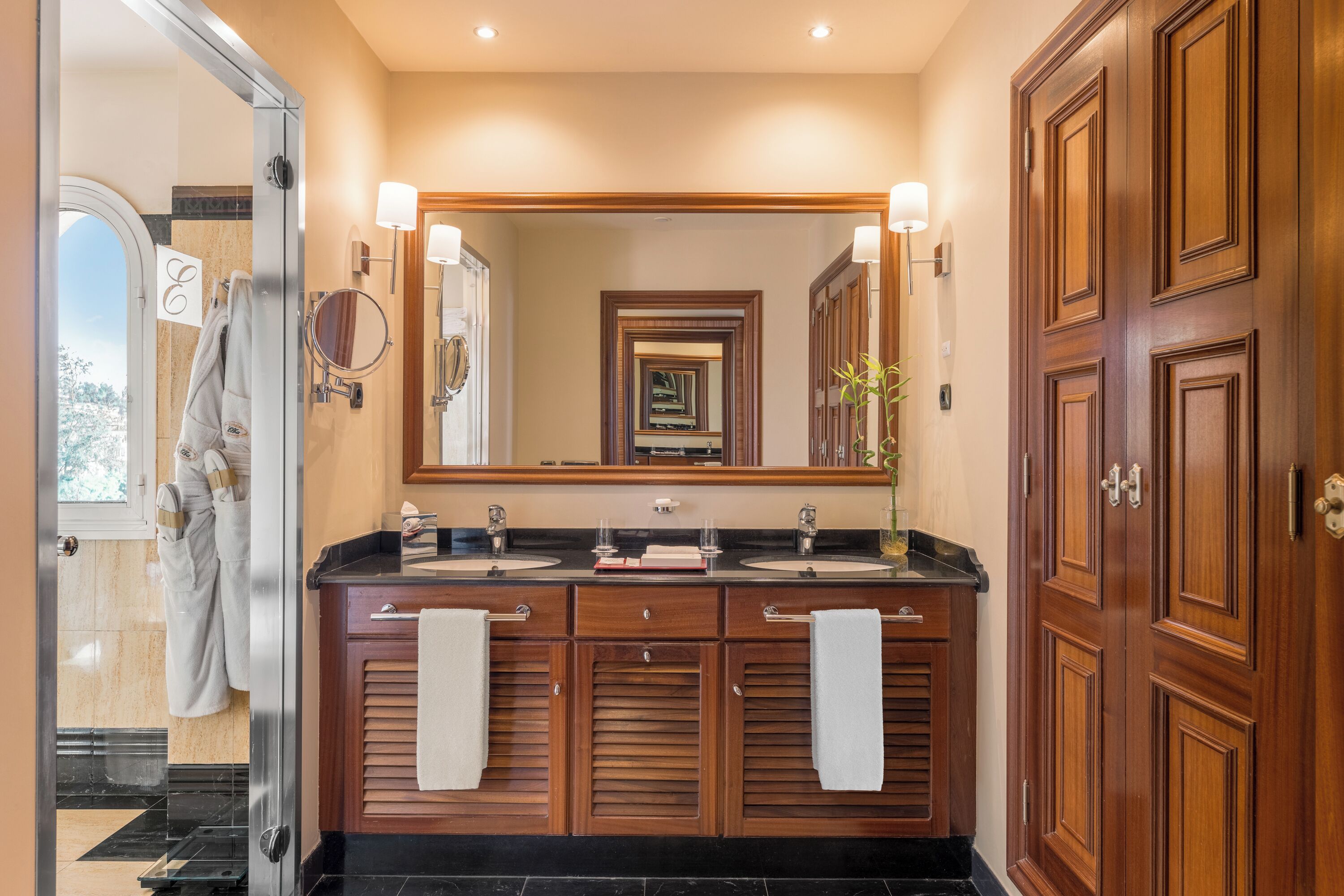 separate bathtub and shower, hair dryer, bathrobes, slippers