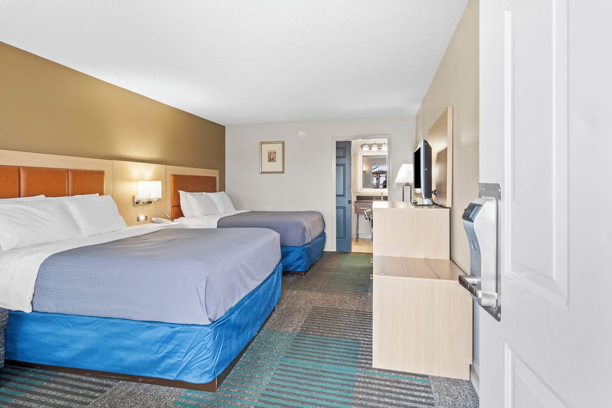 Standard Room, 2 Queen Beds, Non Smoking | 1 bedroom, desk, laptop workspace, soundproofing