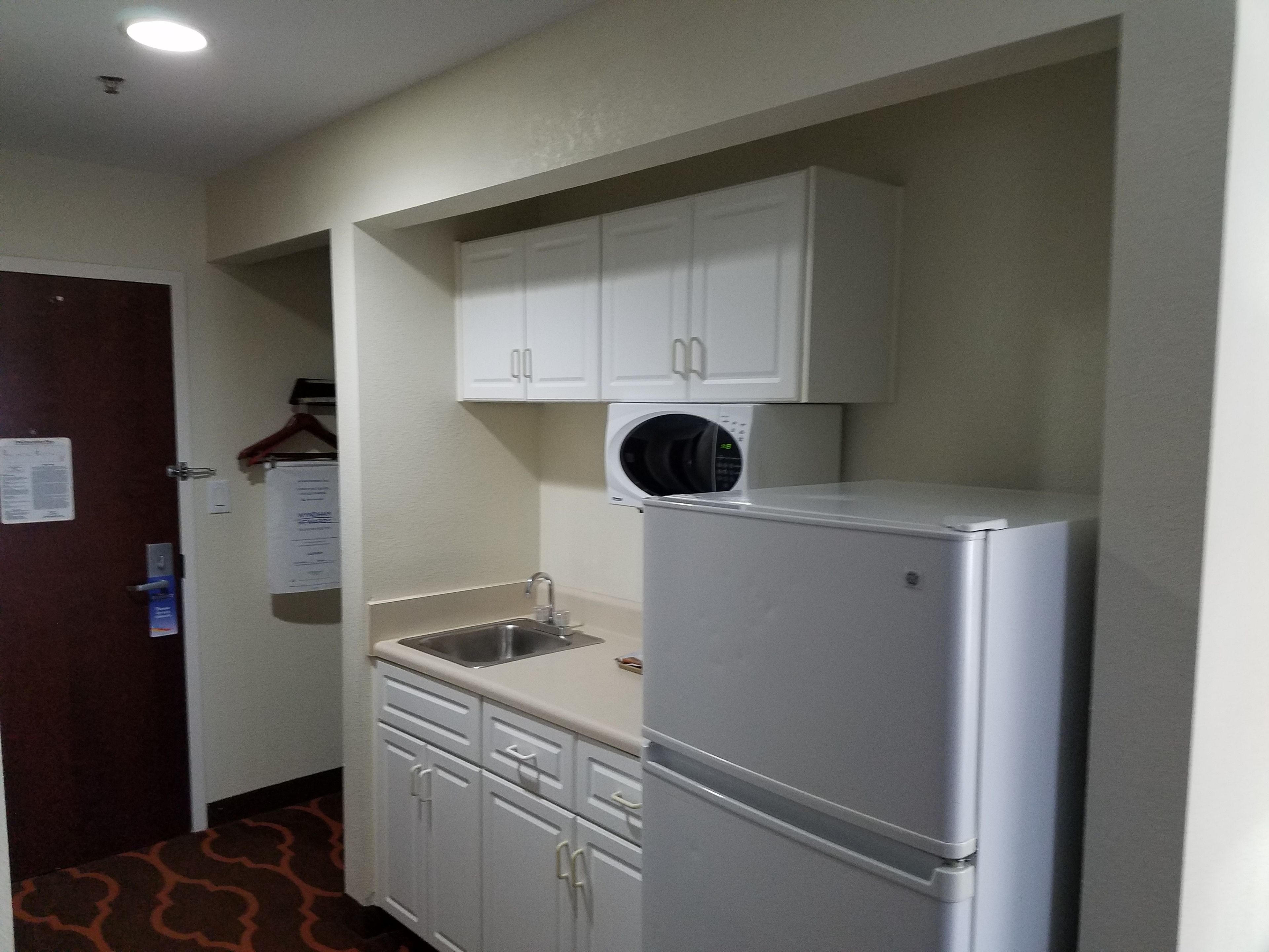 premium bedding, down duvets, desk, blackout curtains