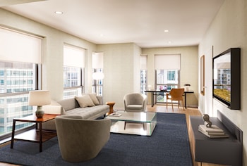 Signature Suite | Living area | 46-inch TV with satellite channels, iPod dock, pay movies at Hotel AKA Back Bay