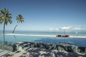 Outdoor pool, open 8 AM to 6:30 PM, pool umbrellas, pool loungers - Four Seasons Resort Seychelles at Desroches Island (Desroches Island)