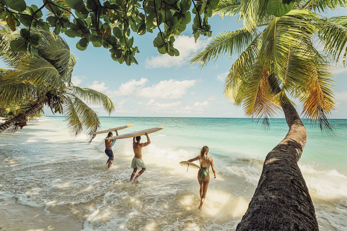 White-sand beach at Four Seasons Resort Seychelles at Desroches Island