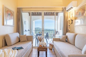 Appartement 6 personnes - 1 chambre + 1 coin nuit - Terrasse ou balcon - Vue mer - Climatisé | Wohnbereich | Flachbildfernseher