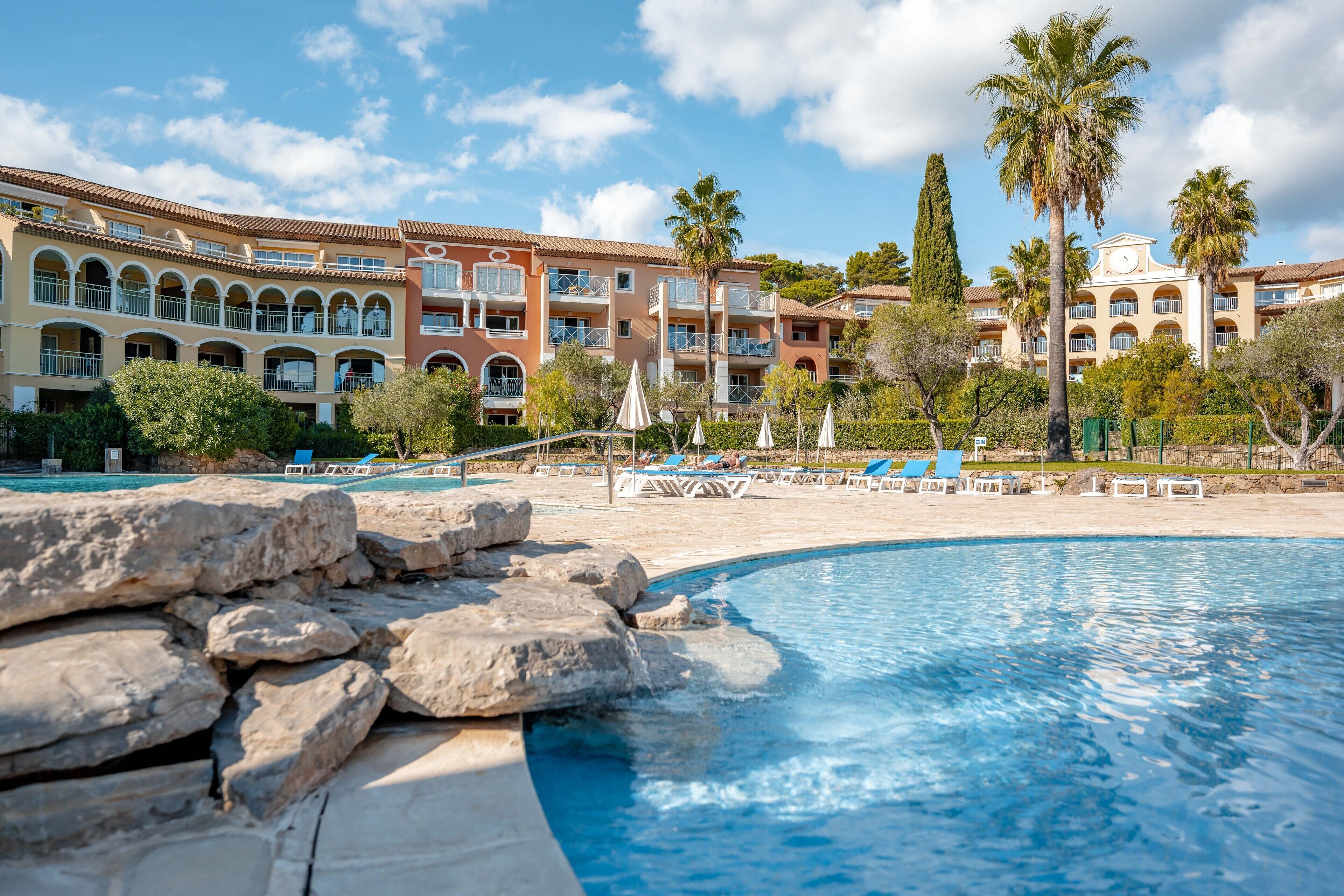 Seasonal outdoor pool, pool umbrellas, pool loungers