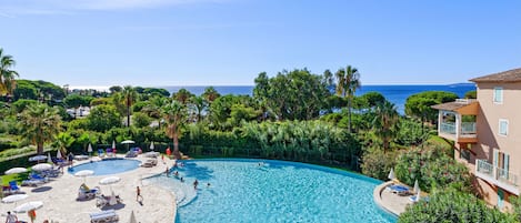 Seasonal outdoor pool, pool umbrellas, sun loungers