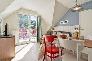 Appartement 4 personnes - 1 chambre - Terrasse ou balcon | Coin séjour