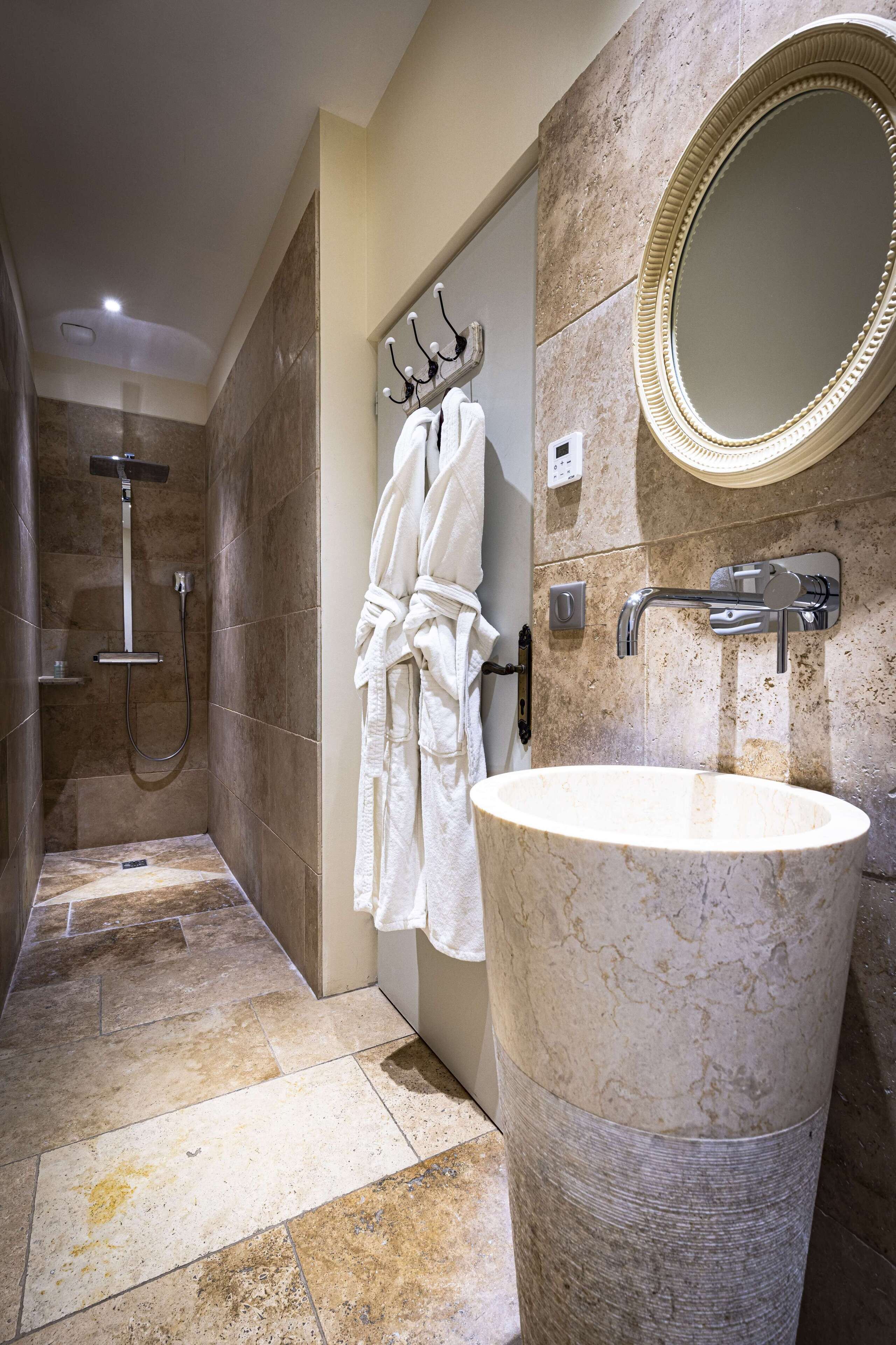 junior suite clos vougeot  | bathroom | designer toiletries, hair dryer, bathrobes, slippers