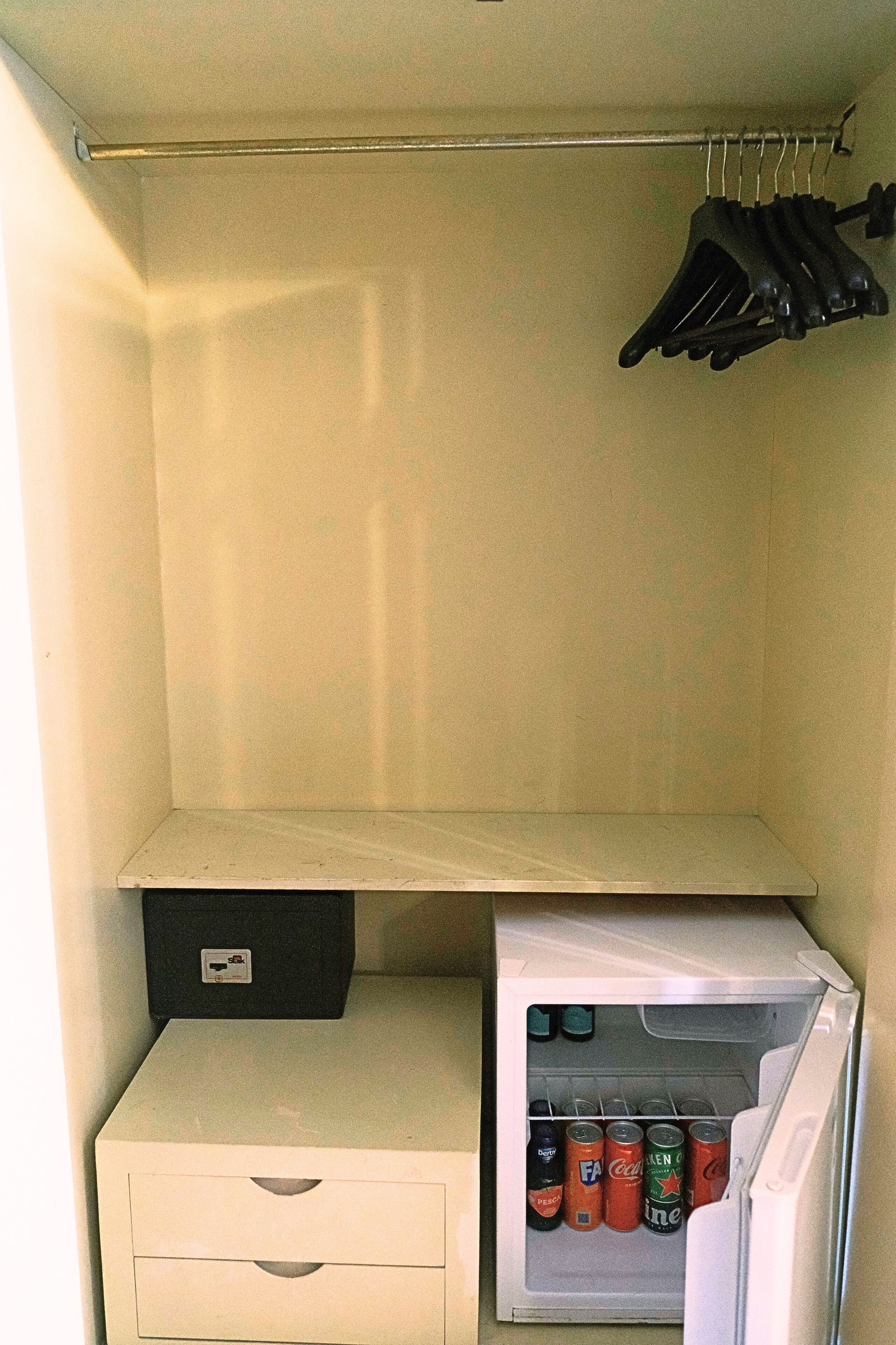 deluxe room, multiple beds, city view, tower | wardrobe