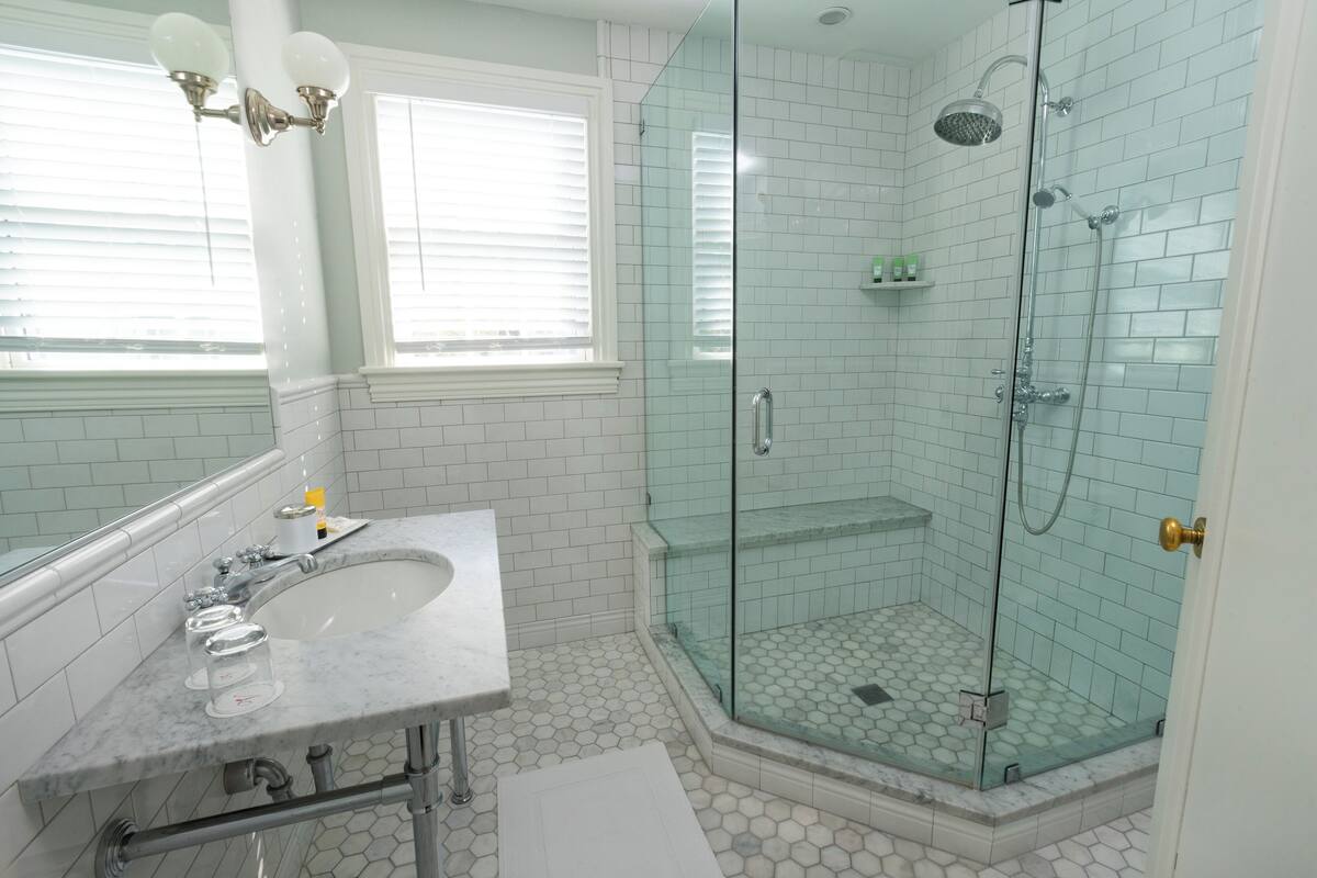 shower, designer toiletries, bathrobes, towels