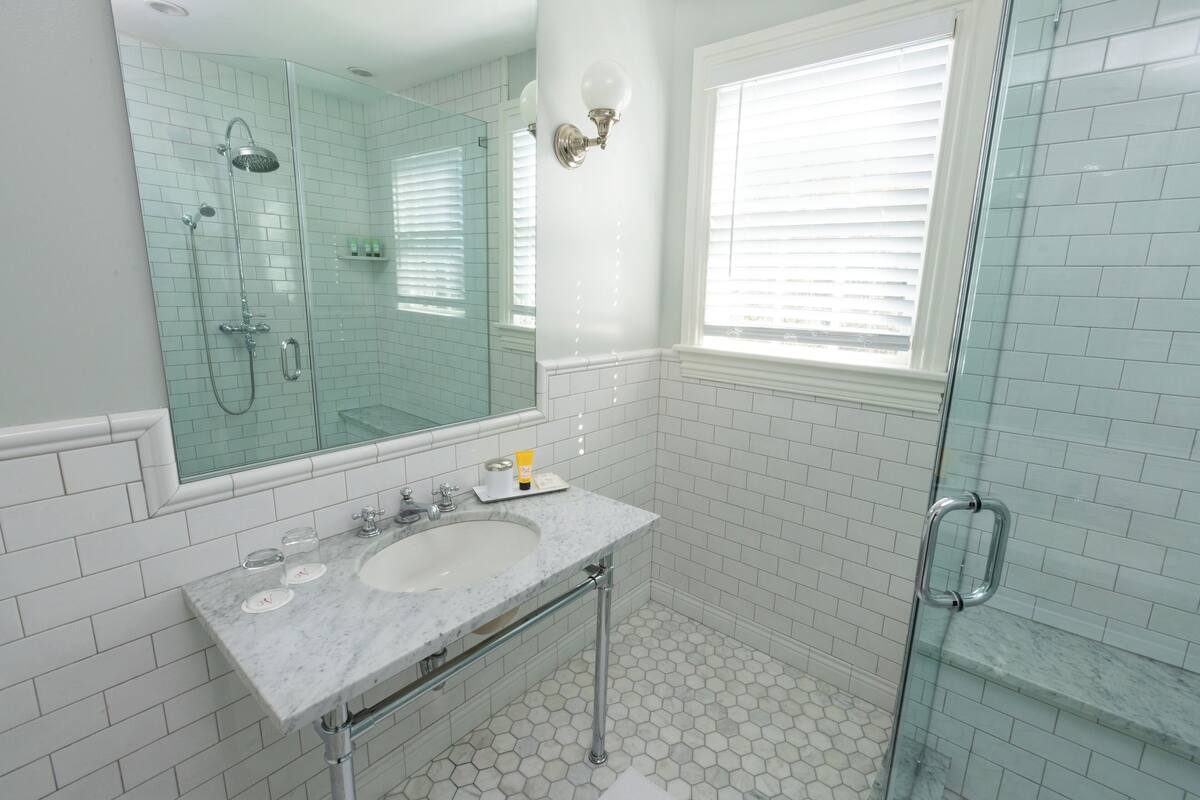 shower, designer toiletries, bathrobes, towels