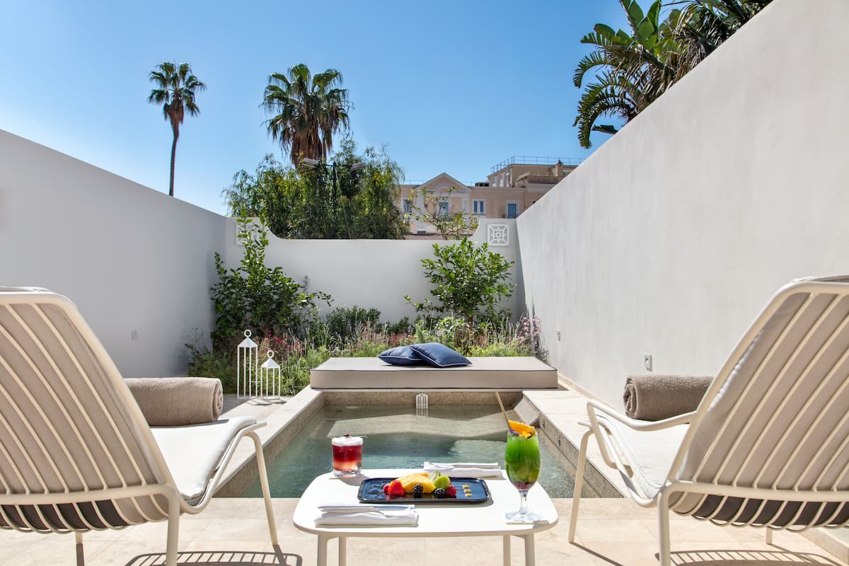 Pool Patio Suite | 1 bedroom, premium bedding, memory foam beds, minibar