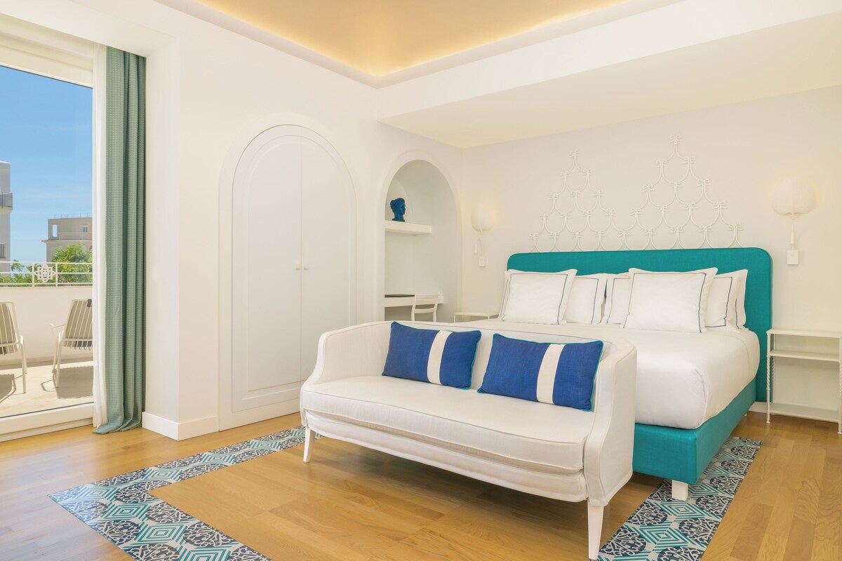 Junior suite, 1 kingsize bed, uitzicht op tuin | Luxe beddengoed, bedden met traagschuimmatrassen, een minibar